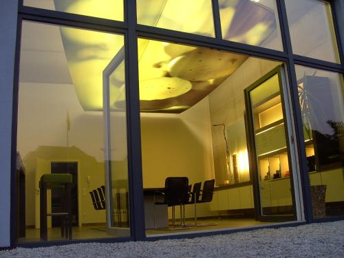 a room with a large window with chairs in it at Weingut Bernd Hermes in Kröv
