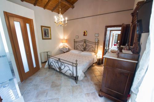 Llit o llits en una habitació de B&B Villa Filetta