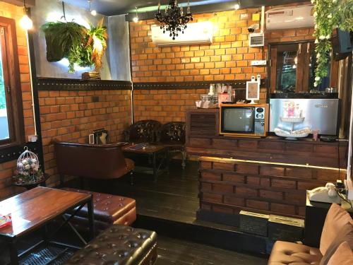 Posezení v ubytování Khum Lanna Boutique Hotel