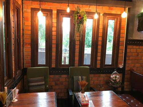 Posezení v ubytování Khum Lanna Boutique Hotel