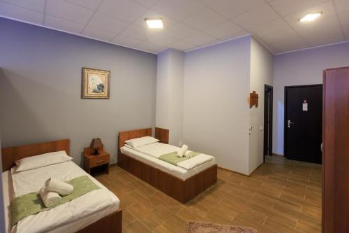 Postel nebo postele na pokoji v ubytování Corner Center Rental