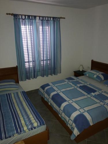 Postel nebo postele na pokoji v ubytování Apartments Juran Sukosan
