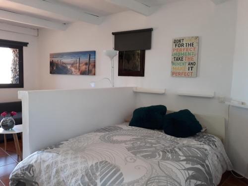 Postel nebo postele na pokoji v ubytování Loft La Tahonilla