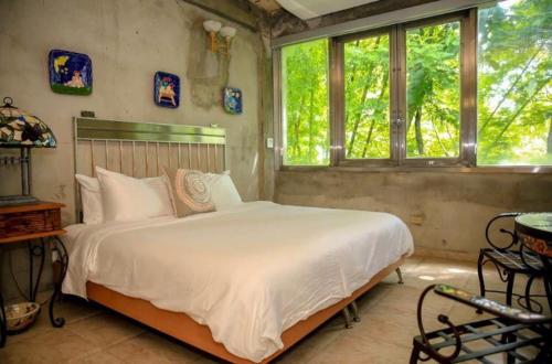 Postel nebo postele na pokoji v ubytování Dos Aguas