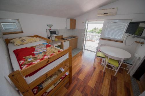 Kuchyňa alebo kuchynka v ubytovaní Apartment Bušljeta