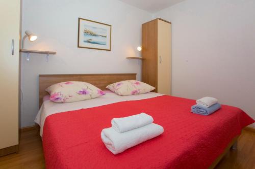 Cama o camas de una habitación en Apartments Blažević
