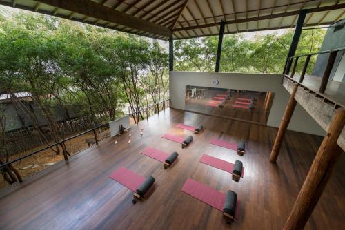 an overhead view of a yoga room with pink mats at KiChic in Máncora