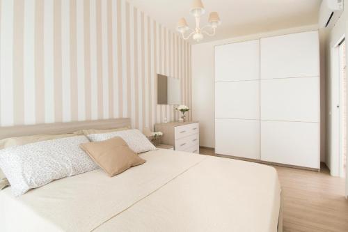 Posteľ alebo postele v izbe v ubytovaní La Dimora di Sofia - ApulianStay Group