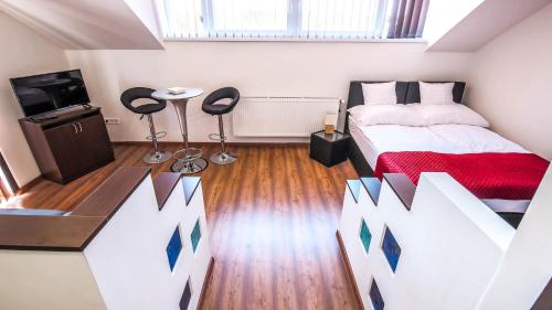 White Apartman Siófokにあるテレビまたはエンターテインメントセンター