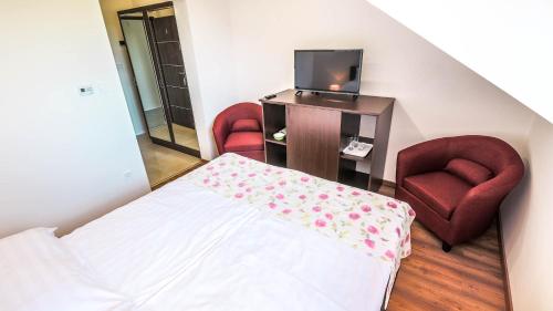 White Apartman Siófokにあるベッド