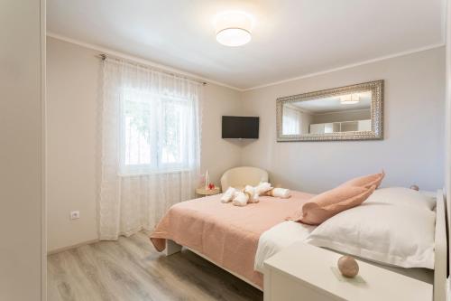 Postel nebo postele na pokoji v ubytování Luxury Apartment Beyond
