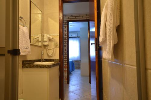 Ванна кімната в Residencial Costa Mar