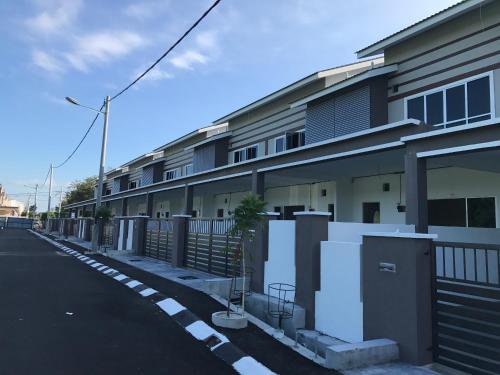 an empty street in front of a building at My STW Home 1 in Sitiawan