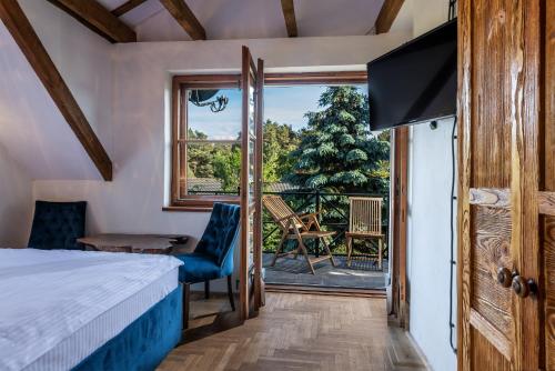 Postel nebo postele na pokoji v ubytování Apartamenty Dom Niezwykly