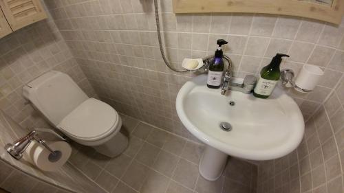 Koupelna v ubytování Sohyundang Guesthouse