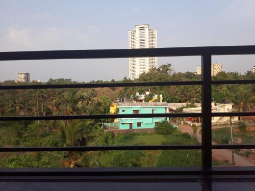 a view from a window of a building at Aikya in Mangalore