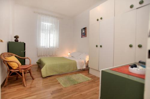 Lova arba lovos apgyvendinimo įstaigoje Apartment Toncika