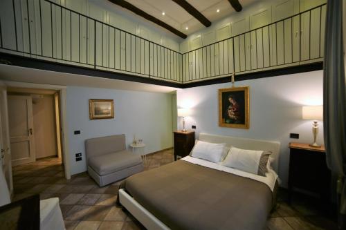 Кровать или кровати в номере B&B Palazzo Solimena