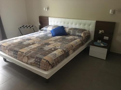 Postel nebo postele na pokoji v ubytování Lollo's Home