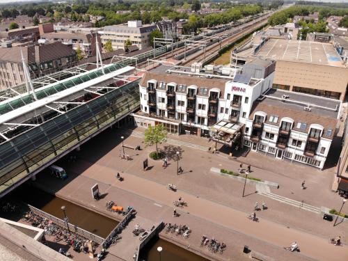 an aerial view of a city with a bridge at JOINN! City Lofts Houten Utrecht in Houten