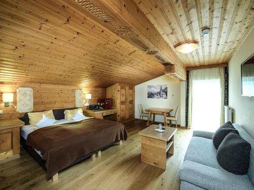 Postel nebo postele na pokoji v ubytování Hotel Victoria