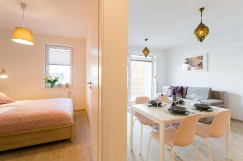 Postel nebo postele na pokoji v ubytování Apartament Rose