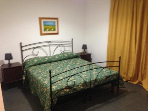 Postel nebo postele na pokoji v ubytování B&B Largo Barile