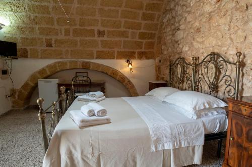 Postel nebo postele na pokoji v ubytování B&B La vecchia Corte
