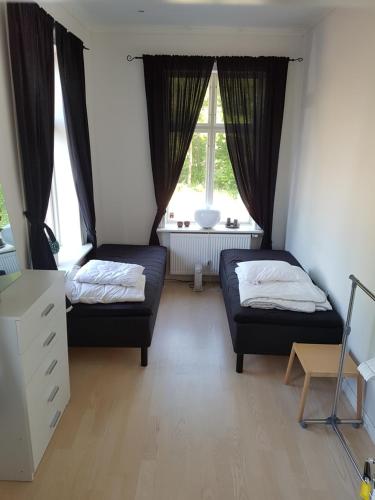 Postel nebo postele na pokoji v ubytování Hörlinge Guesthouse