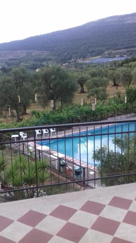 a view of a swimming pool from a balcony at L'Oasi in Auletta
