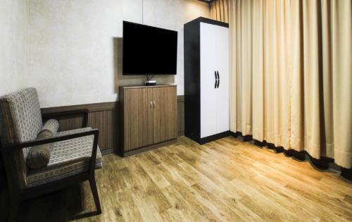 TV a/nebo společenská místnost v ubytování Uljin Grand Hotel