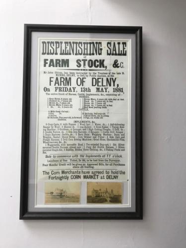 a framed picture of a sign for a farm store at The ‘Servants Quarters@Delny House’ in Invergordon