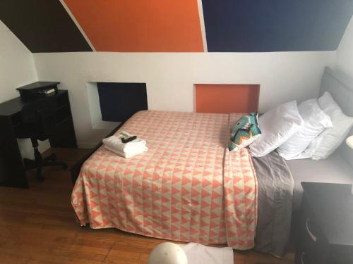 Postel nebo postele na pokoji v ubytování Hollywood Rentals LLC