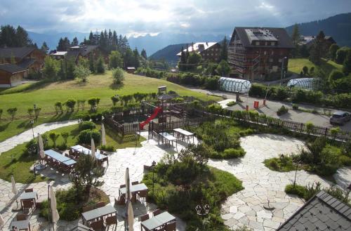 an aerial view of a park in a resort at Résidence RoyAlp - Appartement 22A in Villars-sur-Ollon