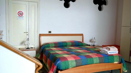 Ένα ή περισσότερα κρεβάτια σε δωμάτιο στο Residence Eden
