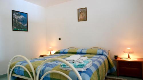 Ένα ή περισσότερα κρεβάτια σε δωμάτιο στο Residence Eden