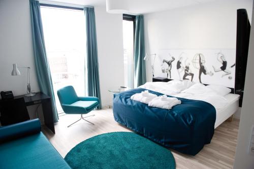 A bed or beds in a room at Hotel DGI-Huset Herning