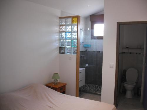 A bed or beds in a room at Appartement Palm'Ares