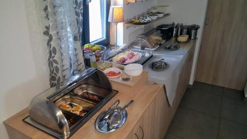Kuchyň nebo kuchyňský kout v ubytování Penzion Merica