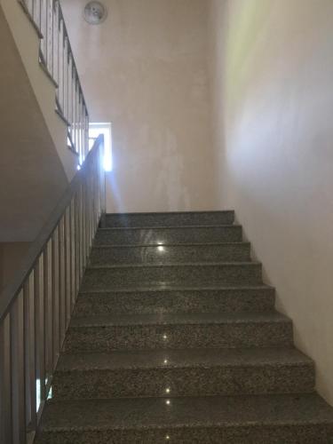 a staircase in a building with a light at the top at Hotel Georgia in Gonio