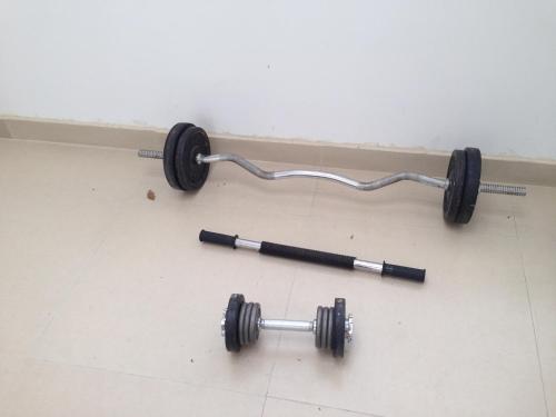 a metal object with two wheels on the floor at Hotel Almond Beach in Tonsupa