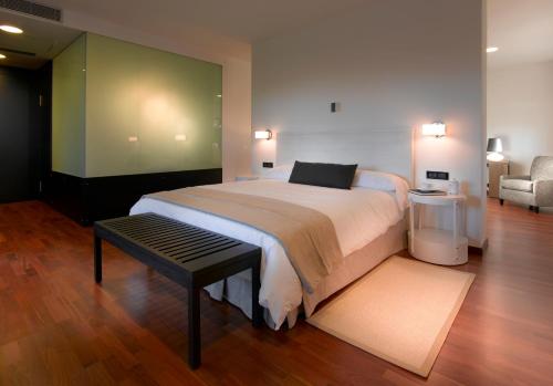 Кровать или кровати в номере Parador de Antequera
