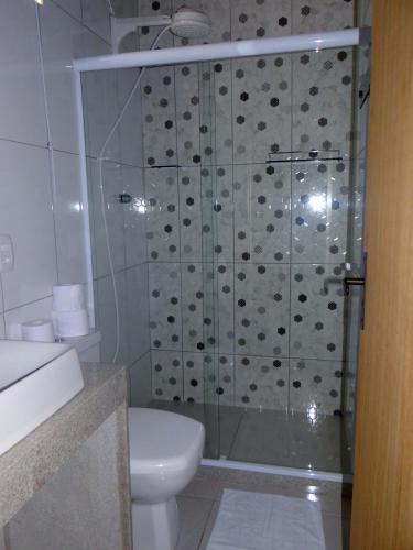 Ein Badezimmer in der Unterkunft Pousada Ninho da Coruja