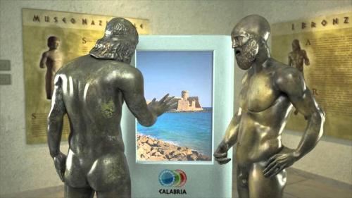 a statue of two men standing next to a picture at La Valle Verde hotel ristorante pizzeria in Zambrone