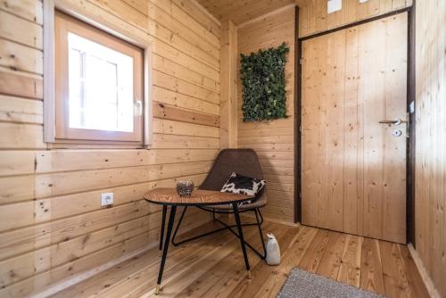a room with a table and a window and a door at Urlaub auf der Alm "Deluxe" in Preggraben