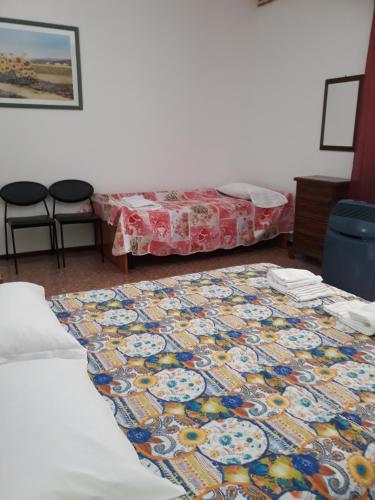 a room with a bed and a rug on the floor at Venice Best Vacation in Marghera