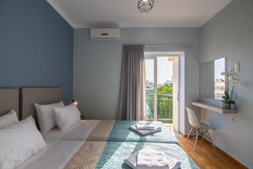 Кровать или кровати в номере N&A Chania Apartment
