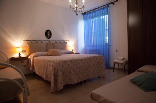 Posteľ alebo postele v izbe v ubytovaní La Fondona