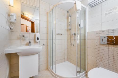 Kúpeľňa v ubytovaní Domus Mater Hotel