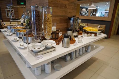 a buffet of food on a table in a store at New Dawn Hotel Plus in Cagayan de Oro